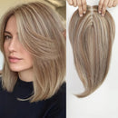 Blonde hair extension shown on a white background