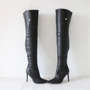Black knee-high boots with high heels on a white background, branded 'Obroi'.