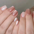 Close-up of hands with pink and glittery nails on a neutral background, Obroi