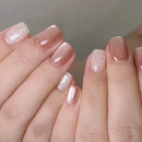 Close-up of hands with pink and glittery nails on a neutral background, Obroi