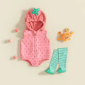 A baby outfit set laid flat on a warm cream background, featuring a pink hooded romper with tiny dark polka dots and a mint green leaf detail on the hood, matching mint green and white striped tights, and a small orange crab toy, Obroi