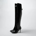 Black patent knee-high boots on a white background, Obroi