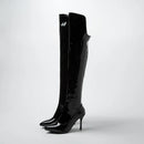 Black patent knee-high boots on a white background, Obroi