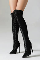 Black lace-up knee-high boots on a gray background, Obroi