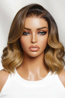 Mannequin head with a styled wig on a white background, Obroi