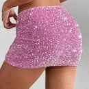 Pink sequin skirt worn by a person on a plain background, Obroi