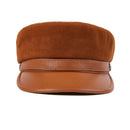 Brown leather cap on a white background, Obroi
