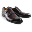 Pair of brown monk strap shoes on a white background, Obroi