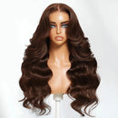 A long, wavy brown wig with deep side parts displayed on a mannequin head against a plain white background. The brand name 'Obroi' is printed in black text in the top-left corner.