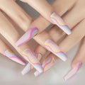 Pastel rainbow nail art on a neutral background, Obroi