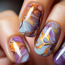 Nails with marbled design in purple, gold, and blue on a neutral , Obroi