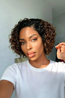 Woman with styled hair wearing a white shirt indoors, Obroi