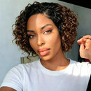Woman with styled hair wearing a white shirt indoors, Obroi