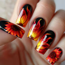 Nails with sunflower design in red, yellow, and black on a neutral background, Obroi