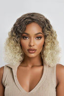 Woman with styled hair against a plain background, Obroi
