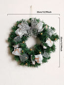 Green wreath with decorative elements and measurements on a light background, Obroi