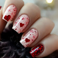 Nails with red heart and glitter design on a blurred background, Obroi