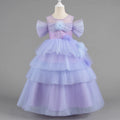 Lavender dress with ruffled sleeves and layers on a mannequin against a gray background, Obroi