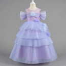 Lavender dress with ruffled sleeves and layers on a mannequin against a gray background, Obroi