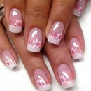 Nails with pink floral design on a white background, Obroi