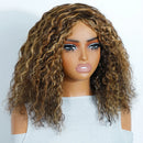 Mannequin head with a curly brown wig on a white background, Obroi