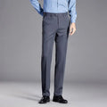 Gray pants worn with a blue shirt on a gray background, Obroi