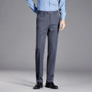 Gray pants worn with a blue shirt on a gray background, Obroi