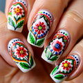 Nails with colorful floral and geometric designs on a white background, Obroi