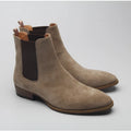 Pair of brown suede Chelsea boots on a light gray background, Obroi