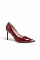A single women's pointed-toe pump in glossy patent burgundy, shown from a side profile on a clean white background, Obroi