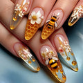 Nails with bee and floral design on a blue background, Obroi