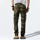 Camouflage cargo pants worn by a person on a white background, Obroi