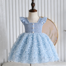 Light blue dress with floral skirt on a mannequin against a white wall, Obroi
