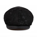 Black checkered cap on a white background, Obroi