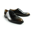 Pair of brown leather dress shoes on a white background, Obroi