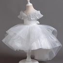 White sparkly dress on a mannequin against a dark background, Obroi