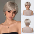A short layered wig with a silver ash blonde color, shown on a model from the front and back, alongside a studio shot of the wig on a mannequin head against a white background, Obroi
