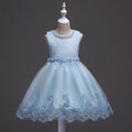 Light blue lace dress on a mannequin against a dark background, Obroi