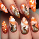 Nail art with rabbits and flowers on an orange background, Obroi