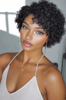 Woman with styled hair against a neutral background, Obroi