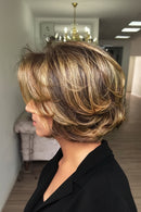 Woman with a stylish short haircut in a salon setting, Obroi