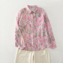 Pink floral blouse on a white background, Obroi