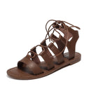 Brown strappy sandal on a white background, Obroi