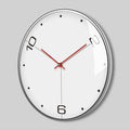 Wall clock with red hands on a gray background, Obroi