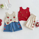 Children's clothing set with red, white, and blue outfits featuring strawberry patterns on a light gray background, Obroi