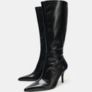 Black knee-high boots on a white background, Obroi