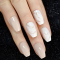 Close-up of a hand with marbleized nail art on a dark textured background, Obroi