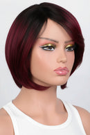 Mannequin head with a burgundy bob wig on a white background, Obroi