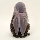 Headscarf with a bow on a wig against a plain background, Obroi