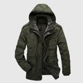 Green hooded jacket on a light gray background, Obroi